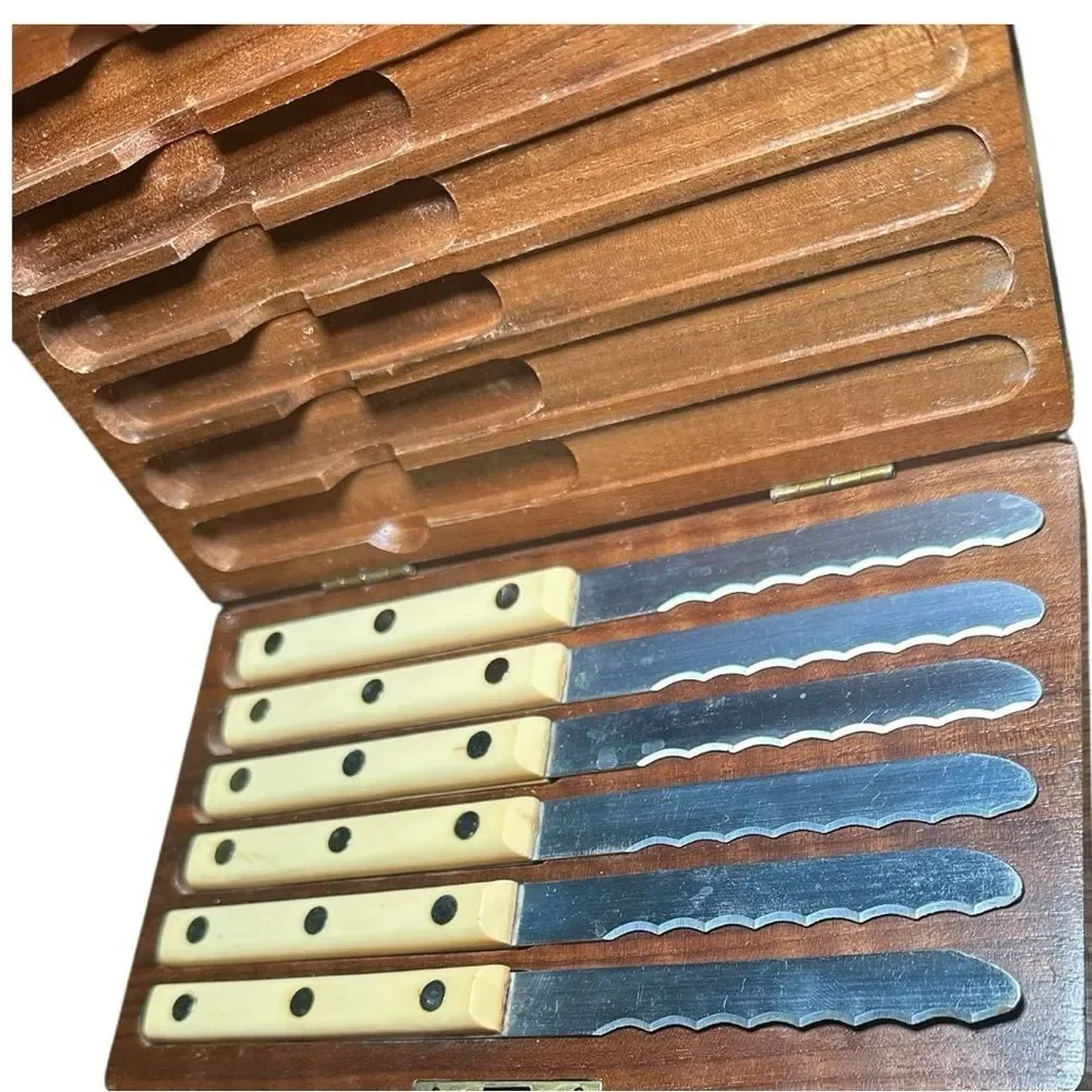 Simmons VTG. steak knives with ivory-colored Bakelite handles & stainless steel